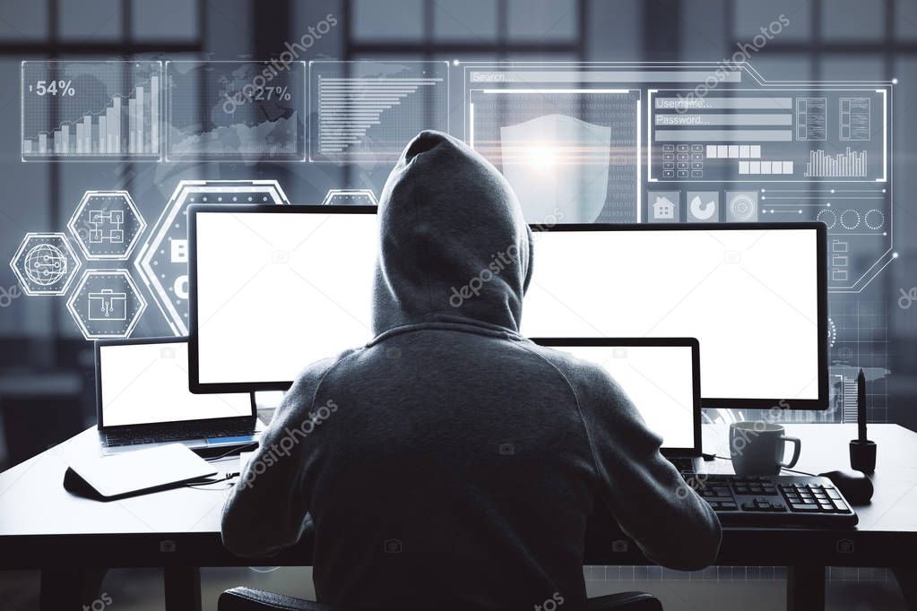 Hacker using laptop with digital business interface in blurry office interior. Hacking and online concept. Double exposure 