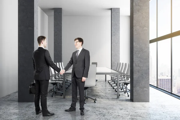 Businessmen shaking hands in new conference room interior with city view and daylight. Teamwork and success concept. 3D Rendering