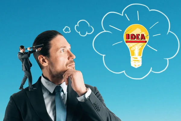 Handsome European Businessman Thinking Idea Lamp Blue Sky Background Innovation — Stock Photo, Image