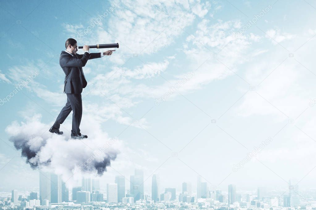 Side view of young businessman on cloud using telescope to look into the distance on bright blue sky background. Vision and job concept 