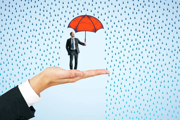 Mão Segurando Homem Negócios Com Guarda Chuva Desenhado Fundo Chuva — Fotografia de Stock