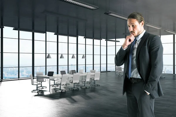 Thoughtful Young Businessman Standing Modern Office Interior — Stock Photo, Image