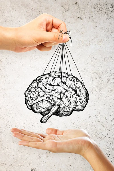 People handing brain sketch on light background. Brain storm and creativity concept