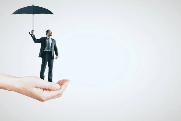 Hand Holding Businessman Umbrella Light Background Success Protection Concept — Stock Photo, Image