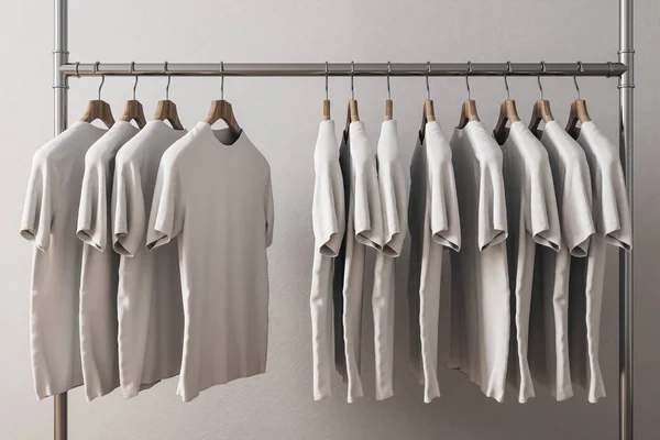 Rij Met Witte Shirts Hangers Betonnen Muur Achtergrond Stijl Design — Stockfoto