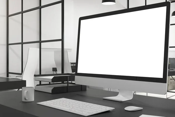 Creative desktop with empty white computer screen in modern office interior. Design and ad concept. Mock up, 3D Rendering