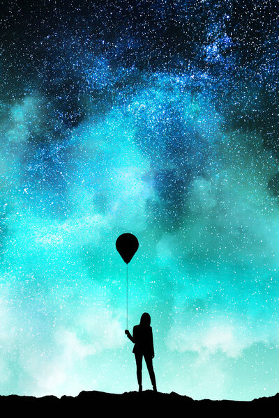 Businesswoman silhouette with balloon standing on beautiful starry sky background. Freedom and way concept