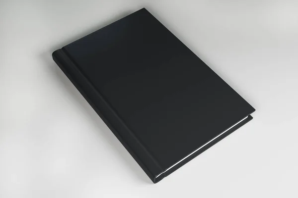 Libro negro en blanco —  Fotos de Stock