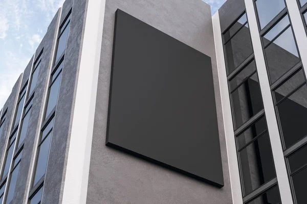 Empty cartellone nero su edificio in cemento — Foto Stock