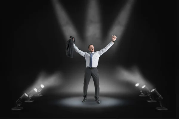 Happy businessman on stage — Stock Photo, Image