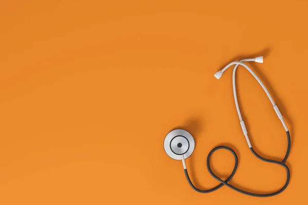 Stetoskop på orange bakgrund — Stockfoto