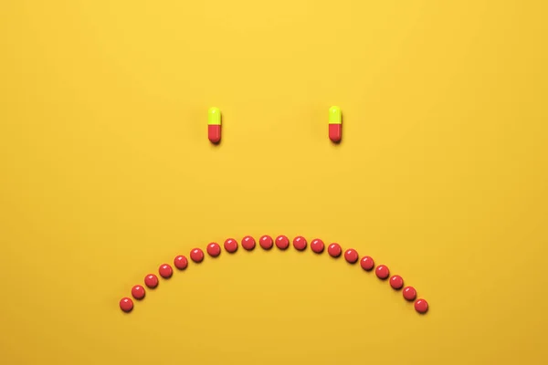 Creative frowning pills background — Stock Photo, Image