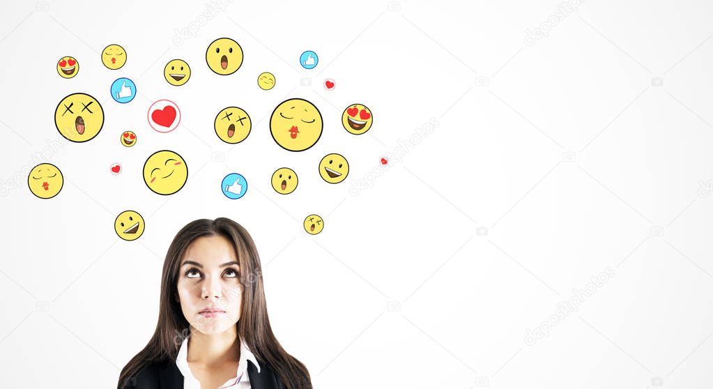 Portrait of attractive businesswoman with smileys 