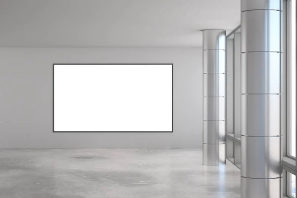 Cartel blanco burlón en blanco sobre pared gris claro en moderno salón amplio de estilo industrial con suelo de hormigón . — Foto de Stock