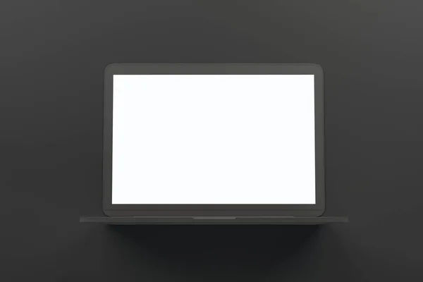 Üres fehér kigúnyol képernyő-ból egyes anyag laptop-on elvont sötét szürke háttér. — Stock Fotó