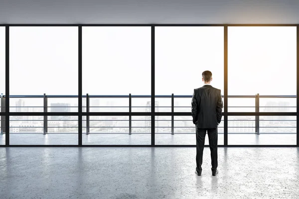 Businessman in interior — Stock Photo, Image