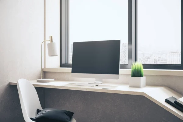 Stylish designer desktop with empty computer screen, lamp on table and city view. Mock up, 3D Rendering