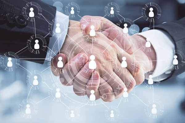 Handshake with global glowing human resource interface. Business and teamwork concept. Double exposure