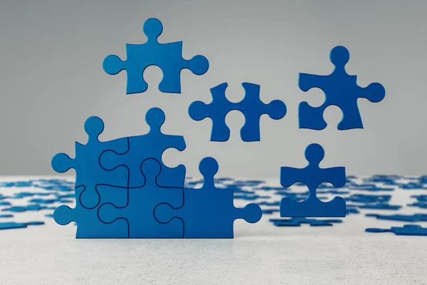 Jigsaw Puzzle Pieces Table Joint Together Business Teamwork Concept Rendering — Stock Photo, Image