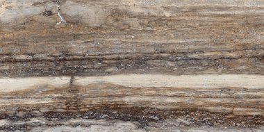 Koyu kahverengi renkli taş desenli doğal damarlı mermer.