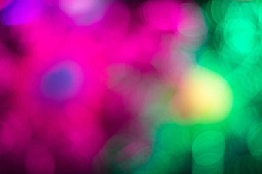 Defocused glitter ışıkları arka plan açtı. Renkli bokeh