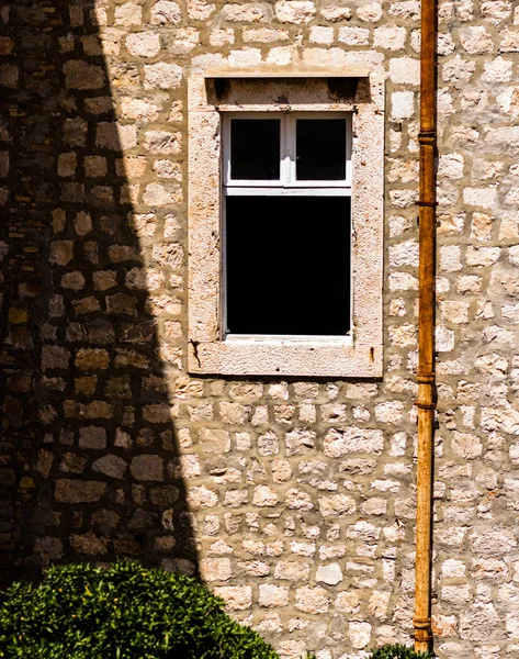 Open window in old building.