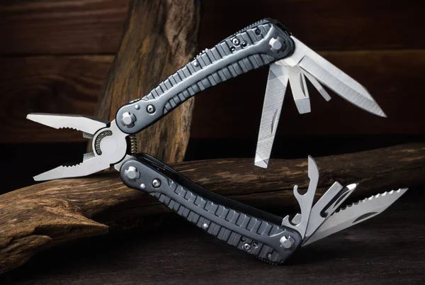 Multitool, universal tool in field conditions. — Stock Photo, Image