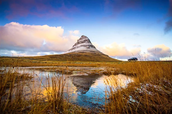 Kirkjufell (Icelandic, Church mountain), a 463 m high mountain on the north coast of Icelands Snaefellsnes peninsula, near the town of Grundarfjordur, Iceland