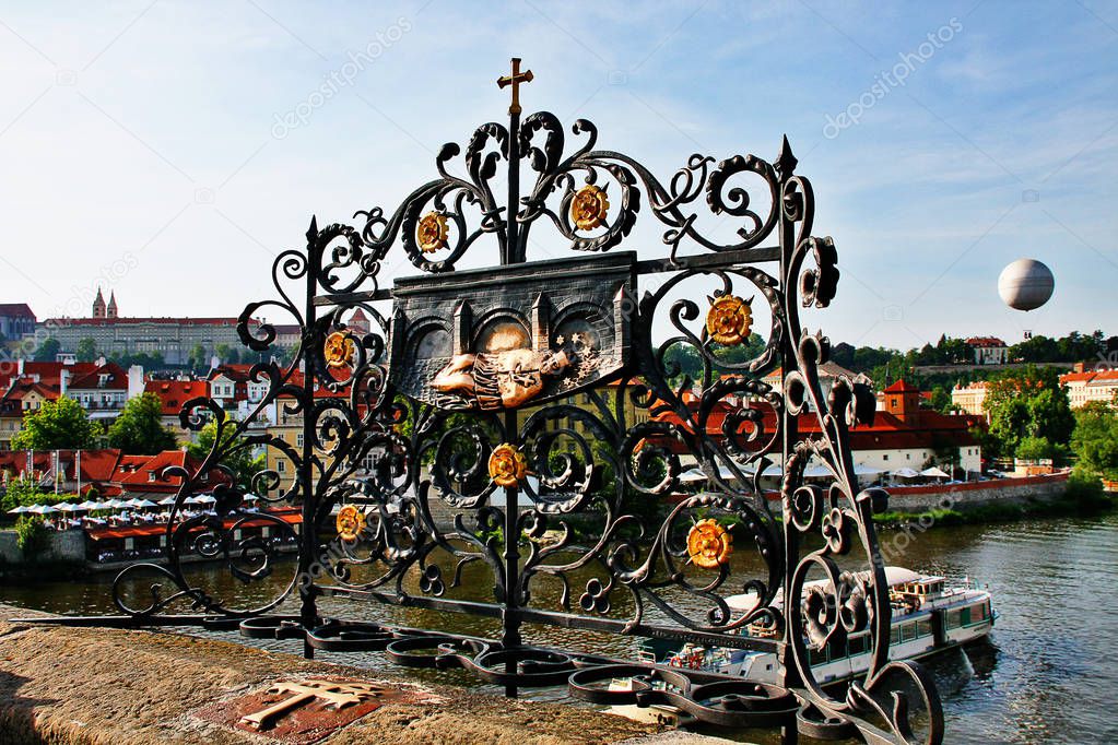 Memorial plate of St. John of Nepomuk (Socha sv. Jana Nepomuckeho) on Charles bridge (Karluv Most), People come to touch for good luck, Bohemia, Prague (Praha), Czech Republic