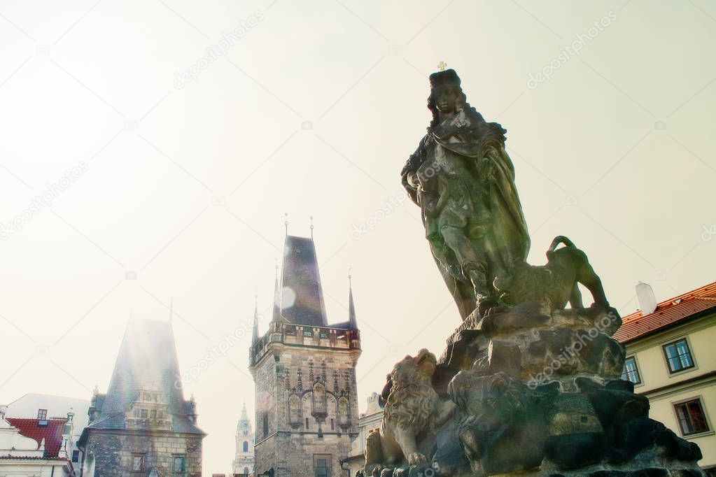 Statue of St. Ludmila on Charles bridge (Karluv Most) with lesser town in background, Prague (Praha), Czech Republic (Ceska Republika), Bohemia