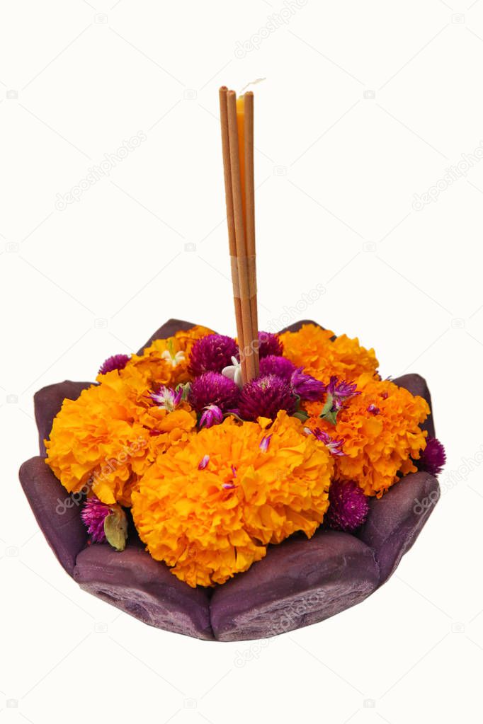 Floating basket made from bread decorated with flower, candle and joss stick for Loy Kratong festival, Thai cultural festival for praying to river usually in full moon day of November