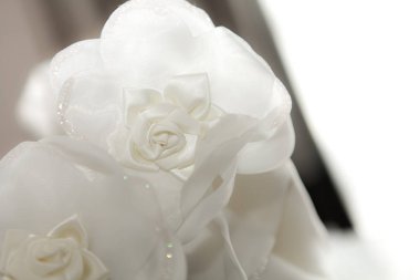 Nonthaburi, Thailand - March 29, 2013 - Artificial flower decoration on Bride dress for new bride in wedding ceremony.
