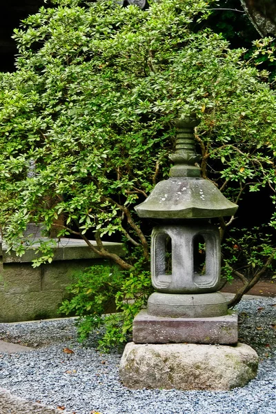 Toro (light basket, light tower) in garden of Kotoku-in temple, Kamakura, Kanagawa Prefecture (Kanagawa-ken), Kanto region, Japan