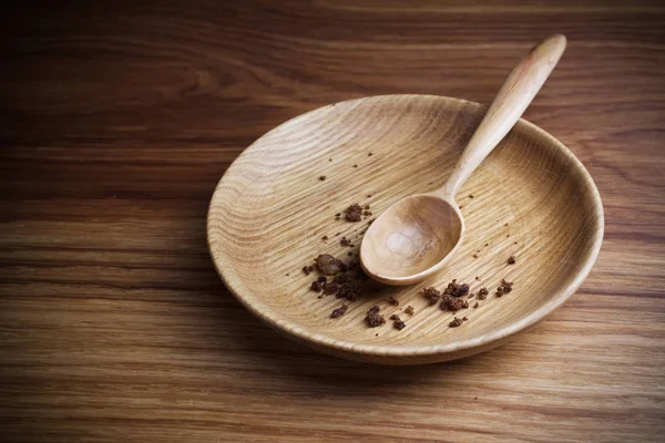 Ayunando, Cuaresma. Placa con cuchara y miga sobre fondo de madera — Foto de Stock