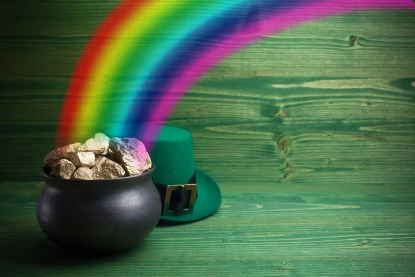 Pot Of Gold on green woden background. Magical Treasure with Rainbow — Stock Photo, Image