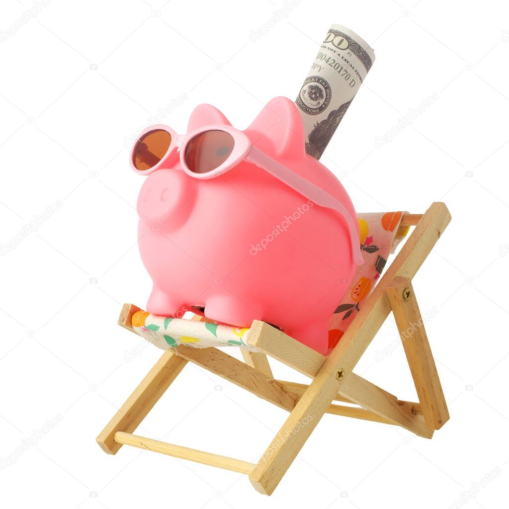 Piggy bank wearing retro sunglasses isolated on white background