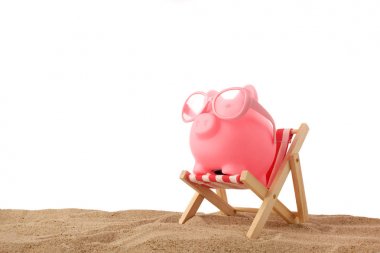 Piggy bank wearing retro sunglasses isolated on white background clipart