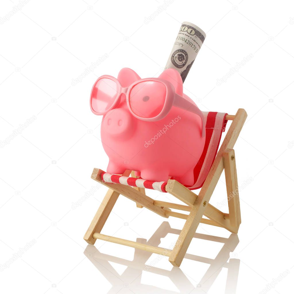 Piggy bank wearing retro sunglasses isolated on white background