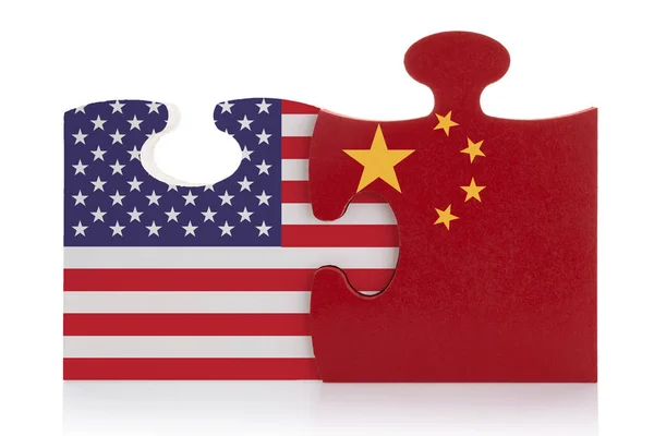 Puzzle pieces with the flags of China and the USA. Trade war concept. — Stock Photo, Image