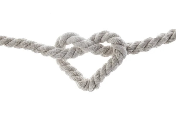 Forma de coração nó de corda isolado no fundo branco — Fotografia de Stock