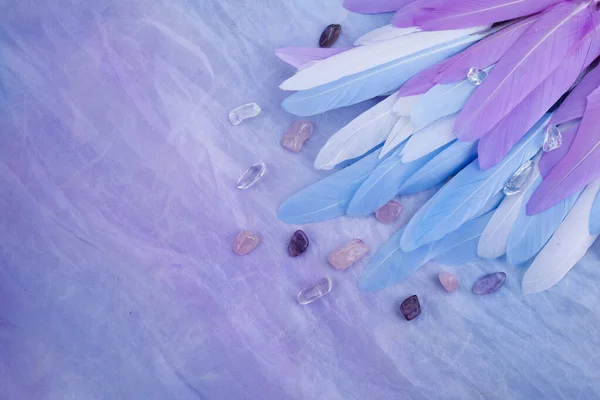 Angel Healing. Feather in the right corner on multi colored background. Top view — Stock Photo, Image