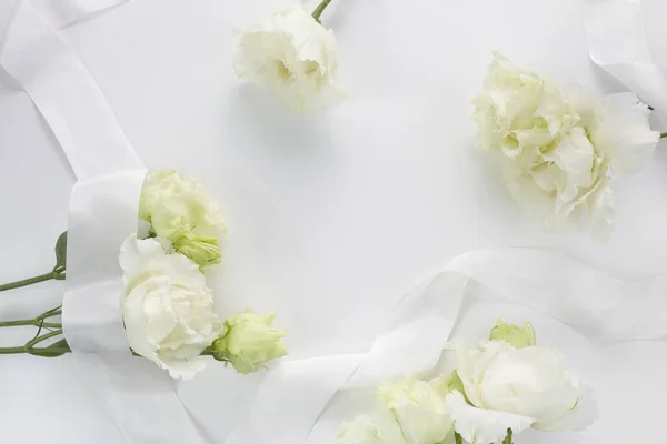 stock image Eustoma flowers background in flat style on white background. Holiday composition. Wedding fashion