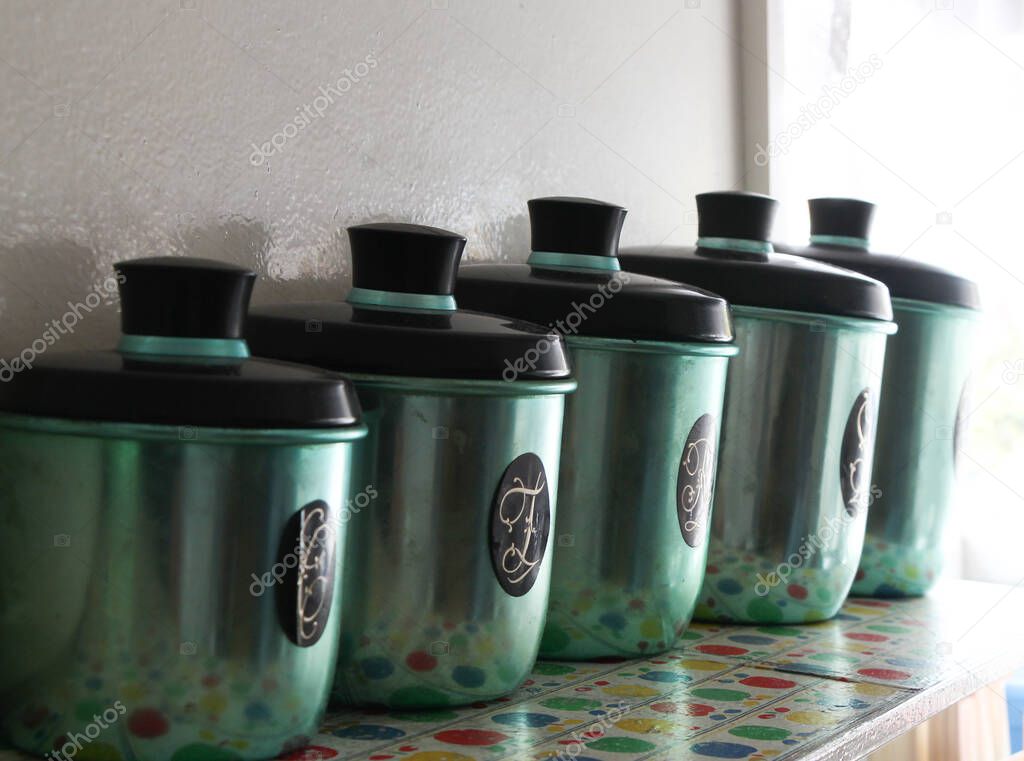 Set of green anodized antique kitchen canisters