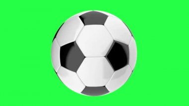 Animasyon yeşil bir arka plan üzerinde dönen futbol topu ilmekledi