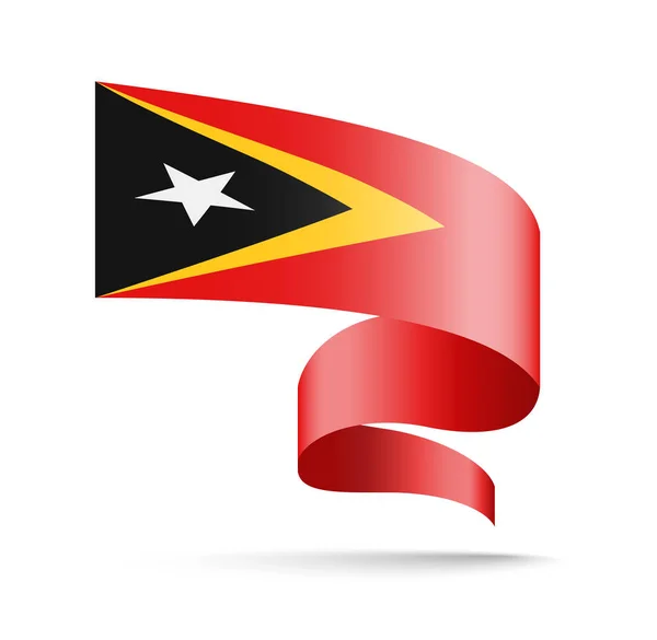 Drapeau du Timor oriental en forme de ruban ondulé . — Image vectorielle