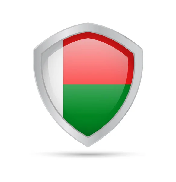 Shield with Madagascar flag on white background. — Stock Vector