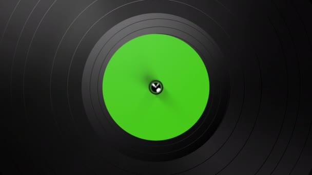 Gravação de vinil preto em uma plataforma giratória. Um fundo de vinil preto com um adesivo verde no centro, girando em um círculo. Looped 3d animação — Vídeo de Stock