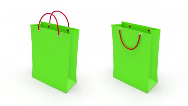 Green shopping bag on white background. — Stock Video