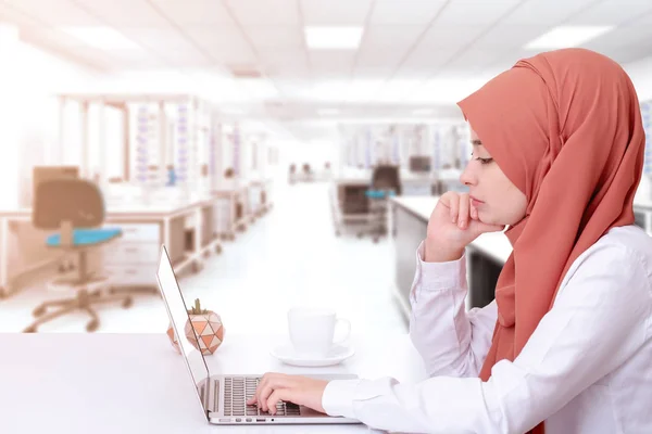 Muslim woman work with computer, hijab muslim girl at lab room