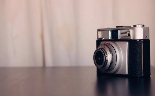 Analog camera on a table.